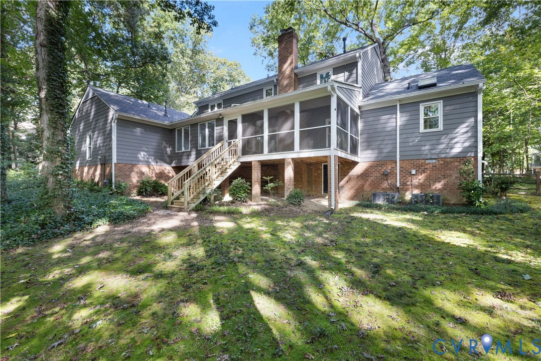8939 Cardiff Road North Chesterfield, VA 23236 - Photo 40 of 45 Back of house with a sunroom, stairway, a chimney,