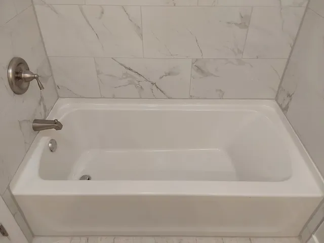 a bathroom with a bathtub
