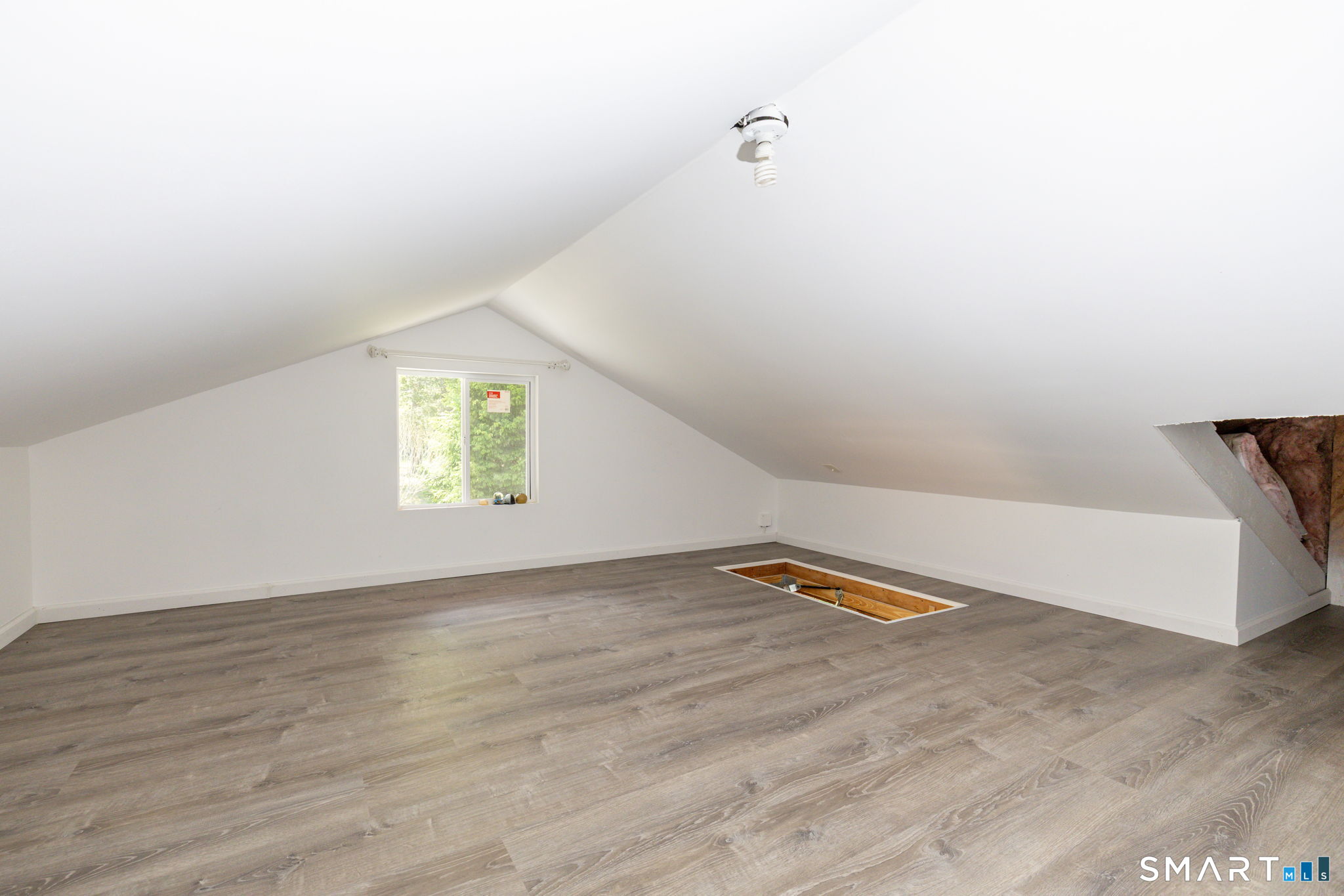 250 Center Hill Road Barkhamsted, CT 06063 - Photo 23 of 40 an empty room with a window