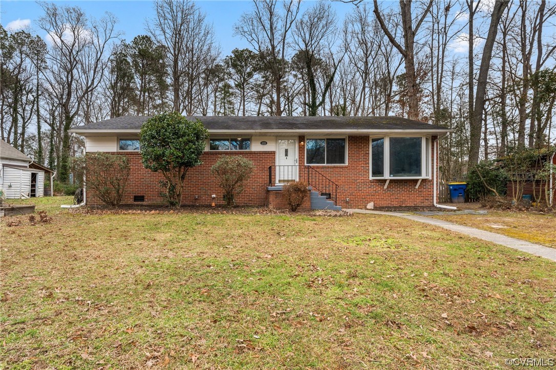 front view of a house with a yard