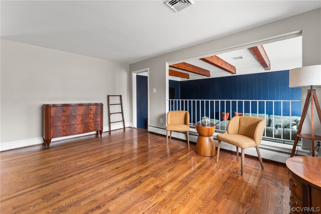 1221 Woodcroft Road Richmond, VA 23235 - Photo 11 of 42 a living room with furniture and a wooden floor