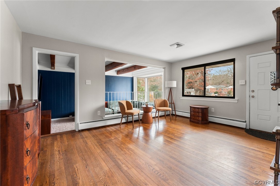 1221 Woodcroft Road Richmond, VA 23235 - Photo 12 of 42 a living room with furniture and wooden floor