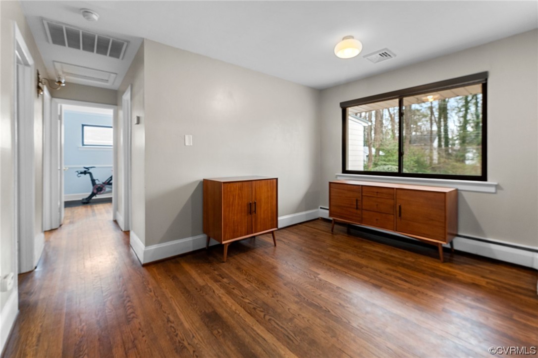 1221 Woodcroft Road Richmond, VA 23235 - Photo 18 of 42 a view of a room with wooden floor and a window