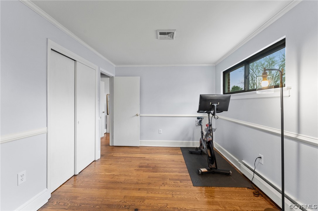 1221 Woodcroft Road Richmond, VA 23235 - Photo 28 of 42 a view of a room with wooden floor and stairs