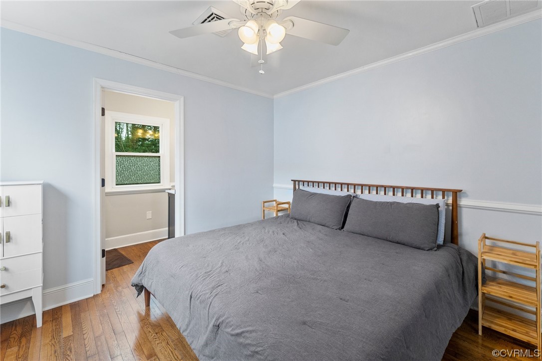 1221 Woodcroft Road Richmond, VA 23235 - Photo 29 of 42 a bedroom with a large bed and a window