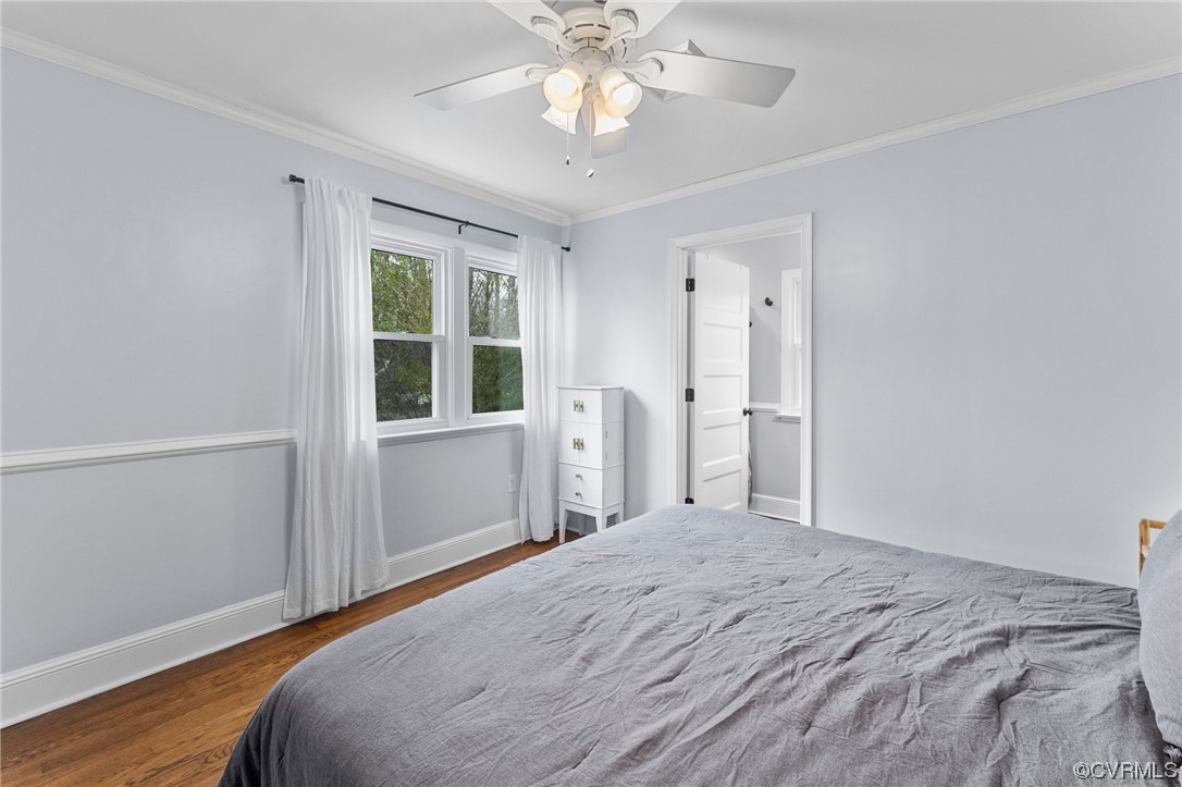 1221 Woodcroft Road Richmond, VA 23235 - Photo 32 of 42 a bedroom with a bed and a window