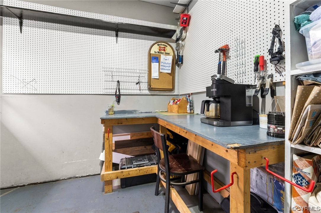 1221 Woodcroft Road Richmond, VA 23235 - Photo 34 of 42 a kitchen with a sink and a refrigerator