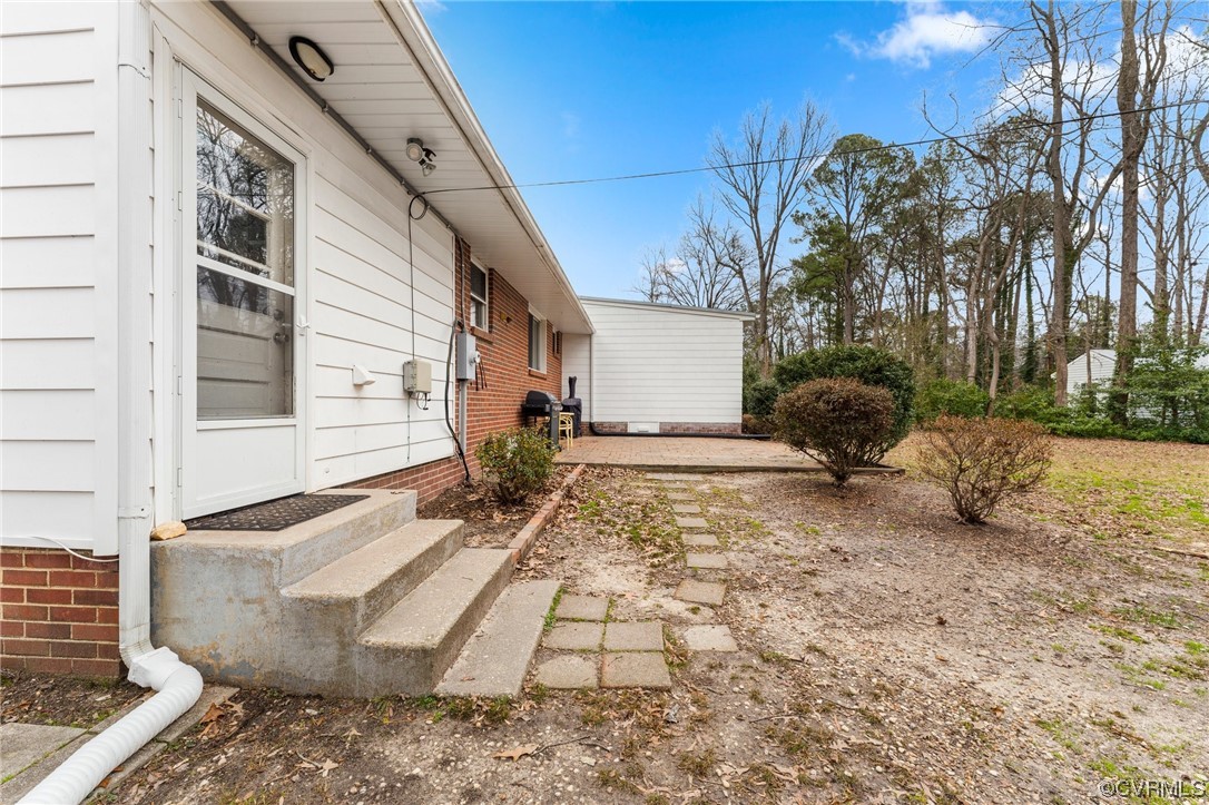 1221 Woodcroft Road Richmond, VA 23235 - Photo 37 of 42 a view of a backyard of the house