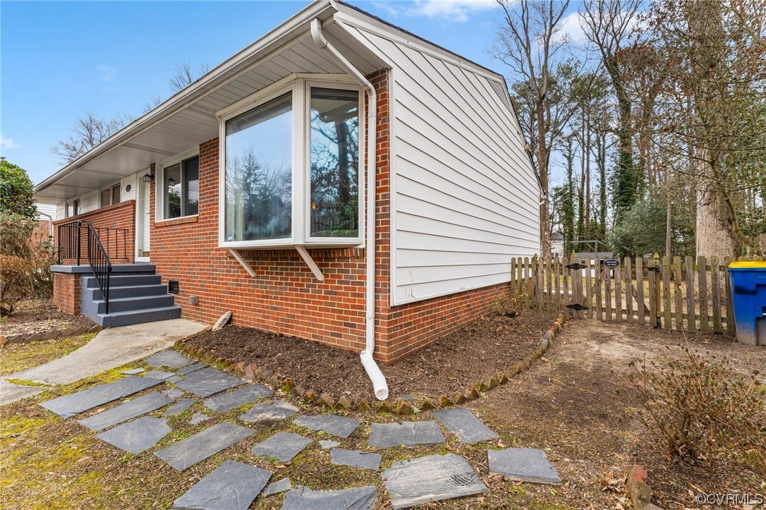1221 Woodcroft Road Richmond, VA 23235 - Photo 4 of 42 a view of a house with a yard
