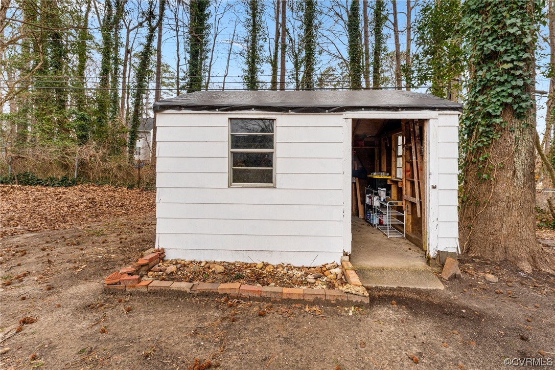 1221 Woodcroft Road Richmond, VA 23235 - Photo 41 of 42 a view of a house with a yard