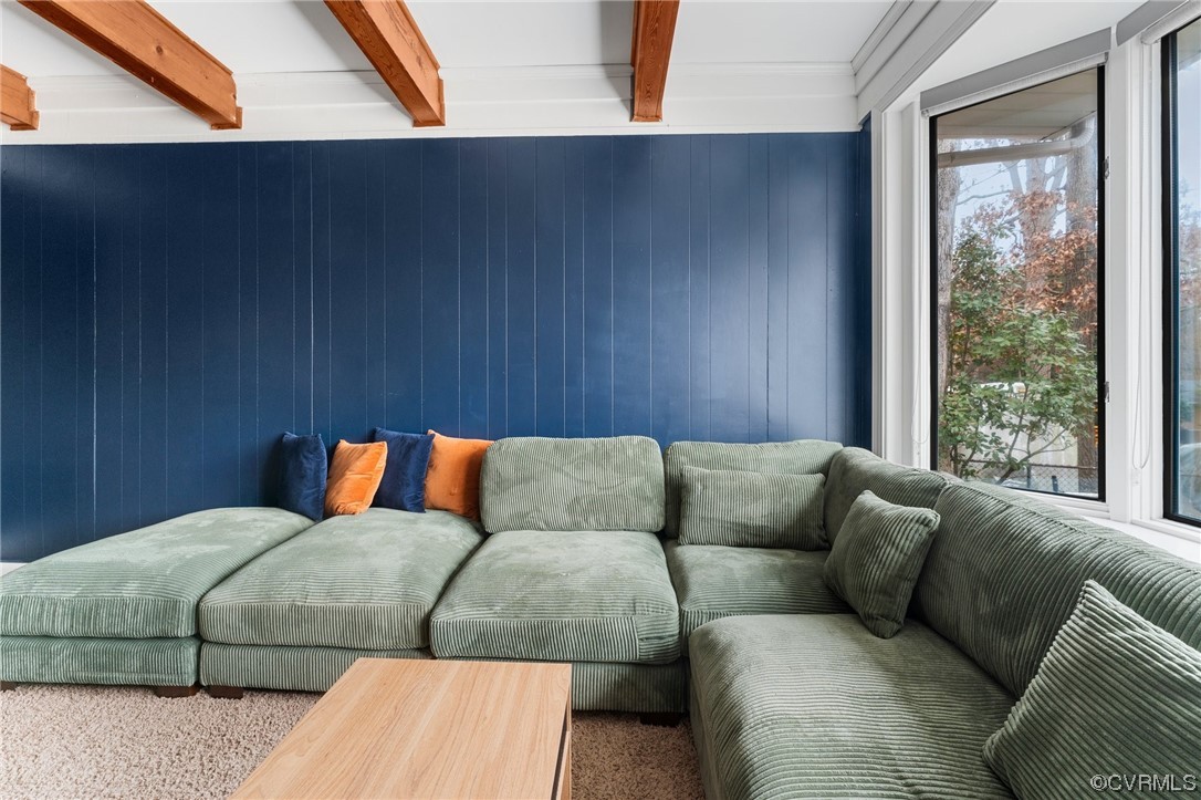 1221 Woodcroft Road Richmond, VA 23235 - Photo 8 of 42 a living room with a couch and a large window