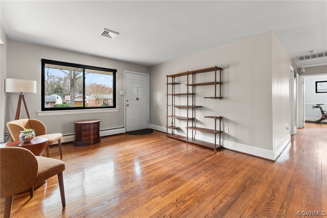 1221 Woodcroft Road Richmond, VA 23235 - Photo 10 of 42 a living room with furniture and a large window