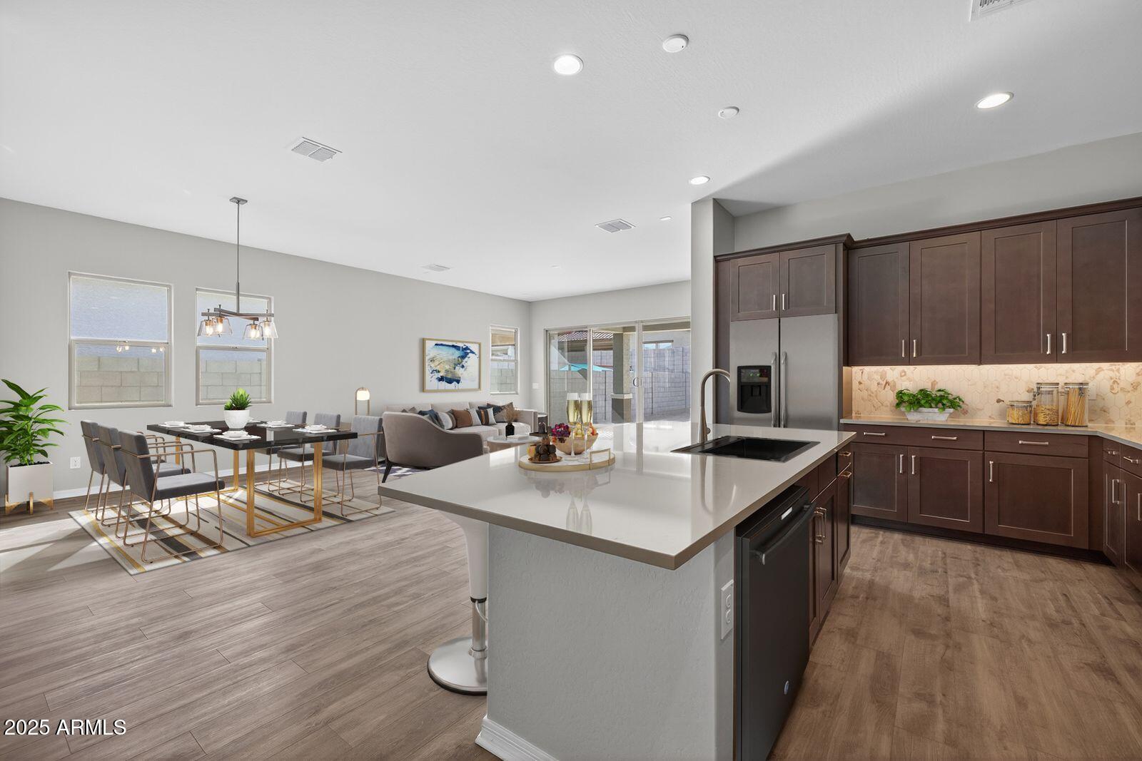 3191 West Santa Rosa Road San Tan Valley, AZ 85144 - Photo 12 of 52 a kitchen with sink and living room