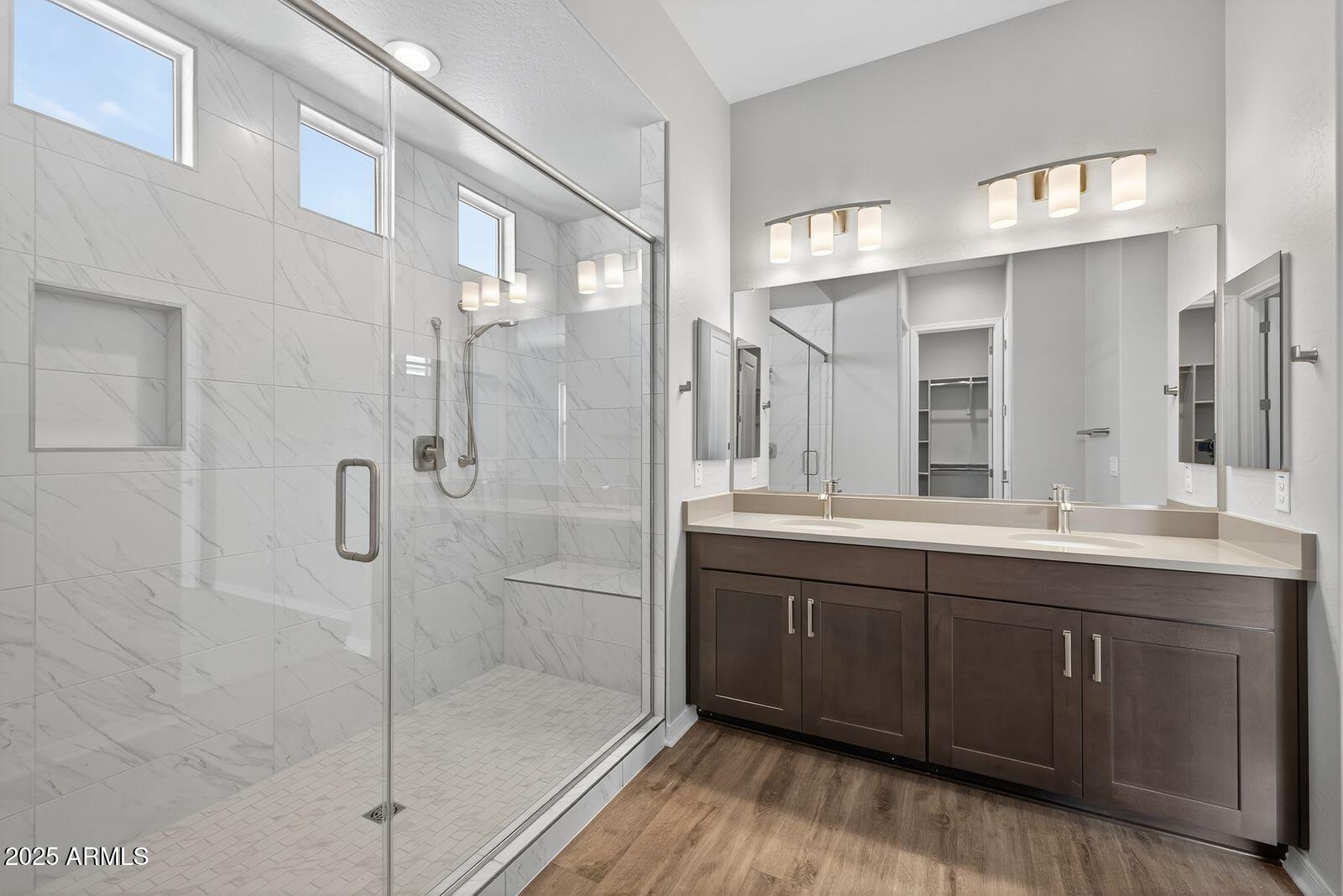 3191 West Santa Rosa Road San Tan Valley, AZ 85144 - Photo 23 of 52 a bathroom with a double vanity sink mirror and shower