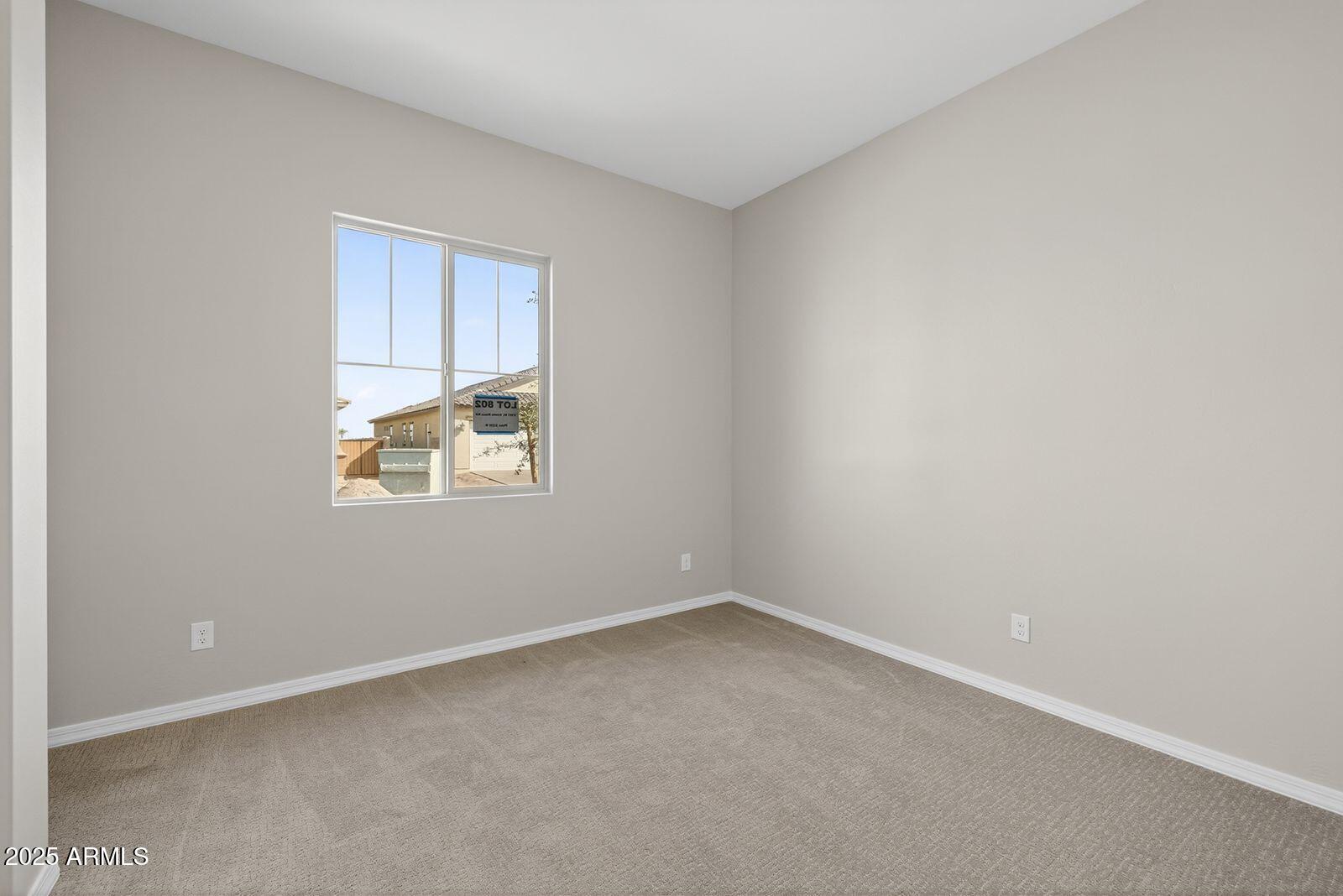 3191 West Santa Rosa Road San Tan Valley, AZ 85144 - Photo 31 of 52 an empty room with a window