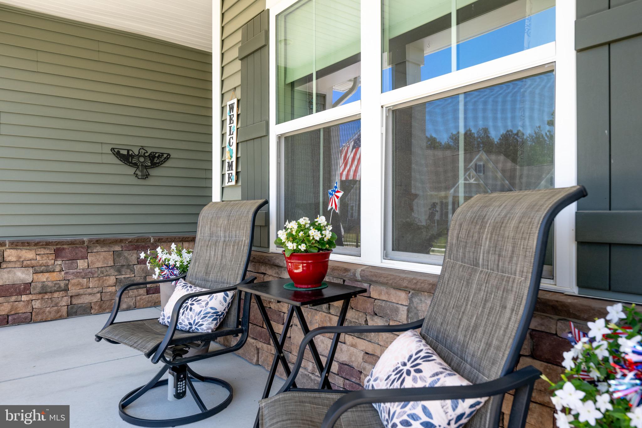 30478 Indigo Way Georgetown, DE 19947 - Photo 40 of 41 a view of a chairs and table in patio