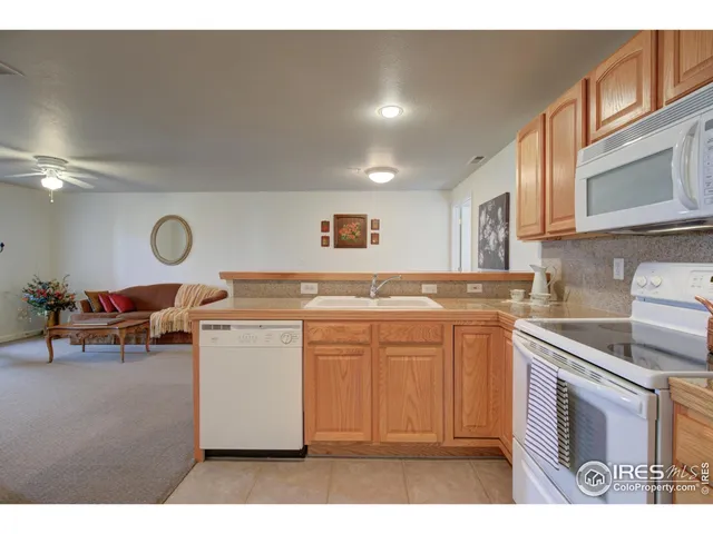 a living room with furniture and window
