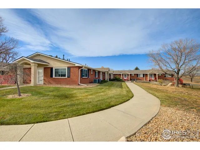 a swimming pool with outdoor seating