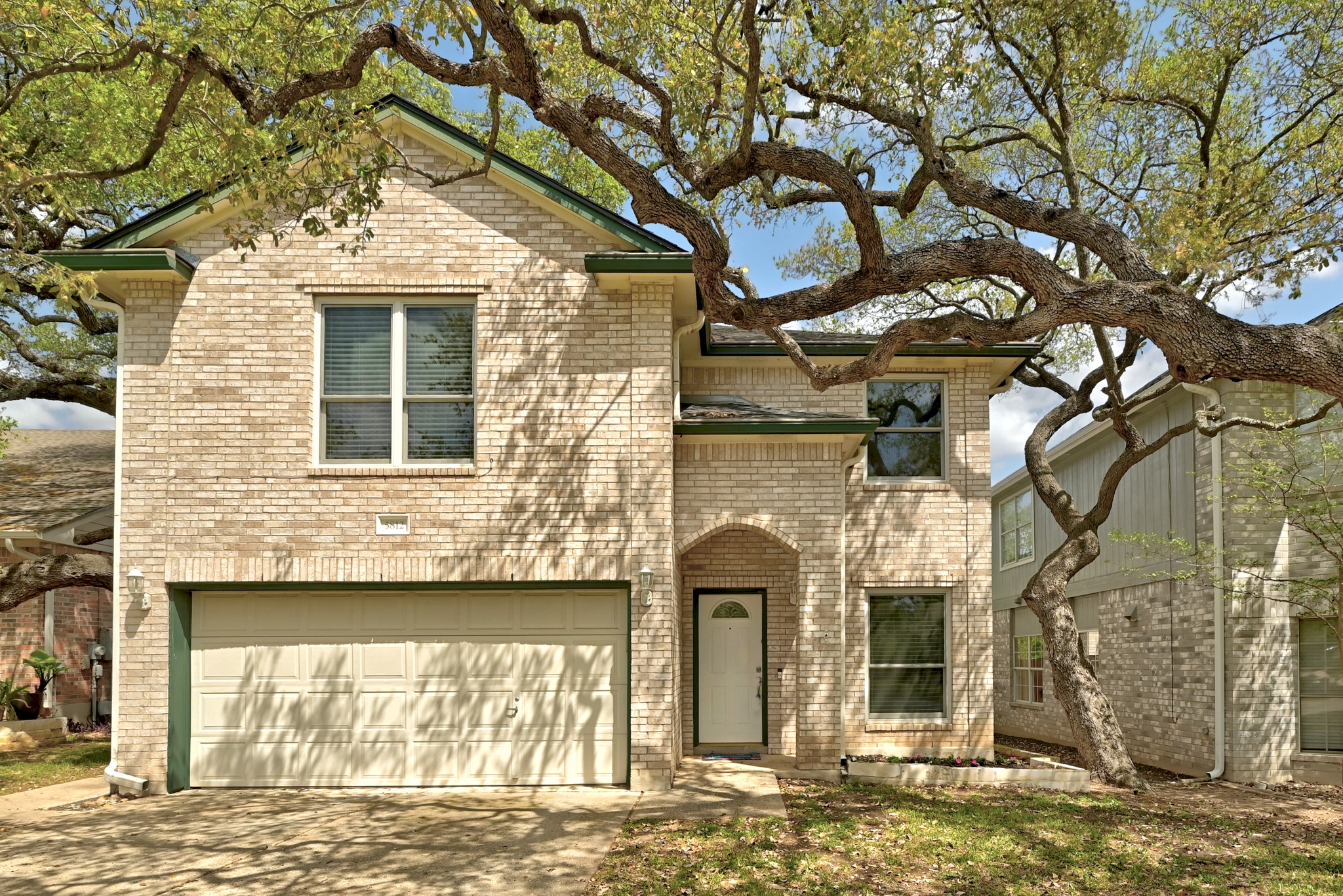 5812 Kayview Drive Austin, TX 78749 - Photo 2 of 31 a front view of a house with a yard