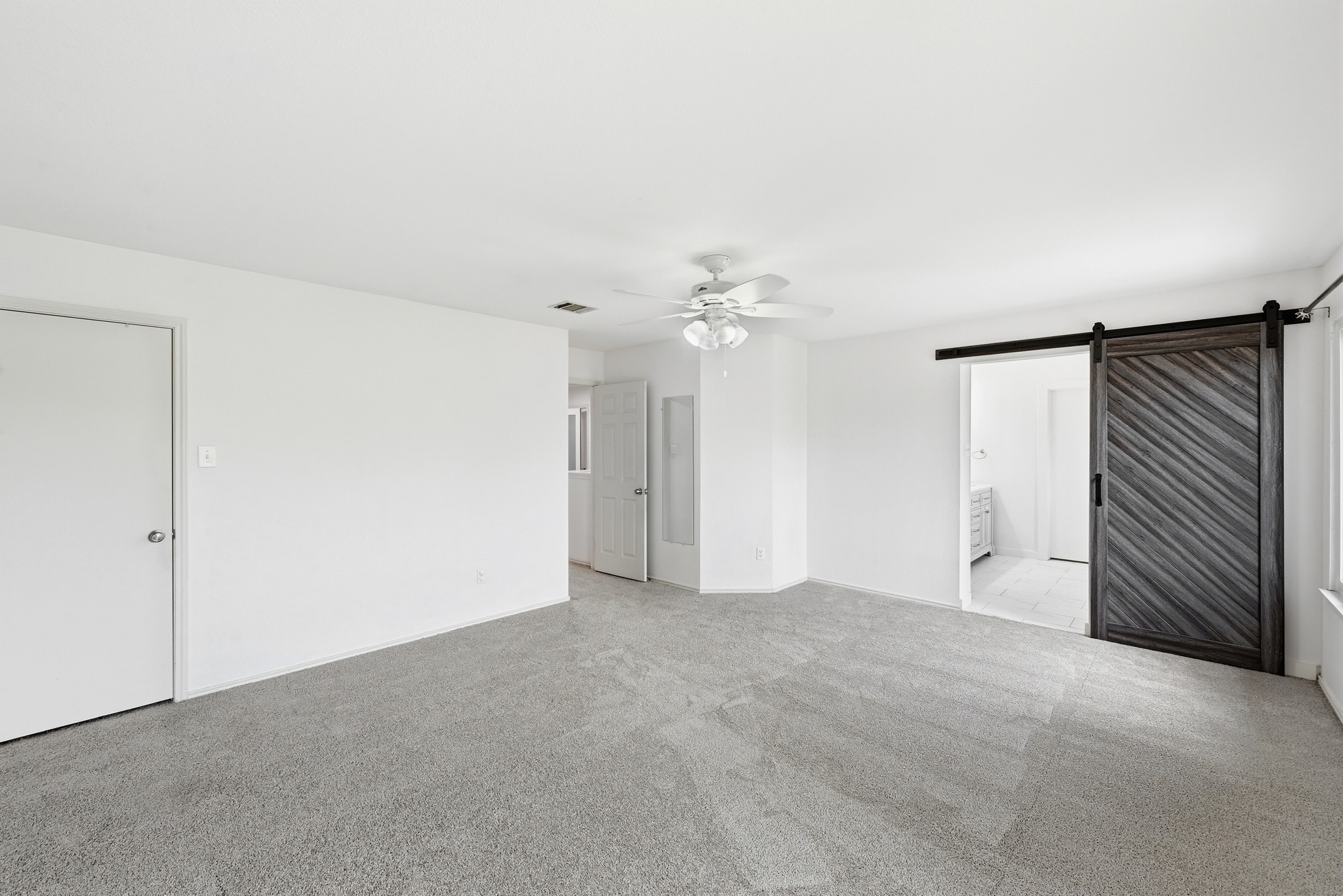 5812 Kayview Drive Austin, TX 78749 - Photo 23 of 31 a view of an empty room with a ceiling fan