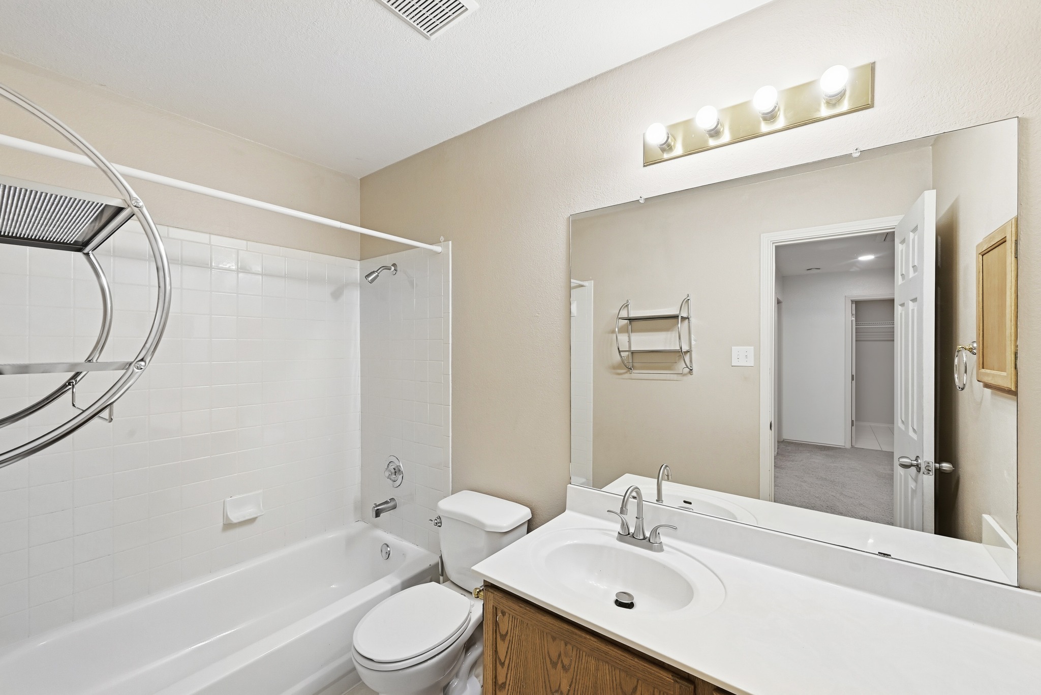 5812 Kayview Drive Austin, TX 78749 - Photo 27 of 31 a bathroom with a sink a toilet and shower