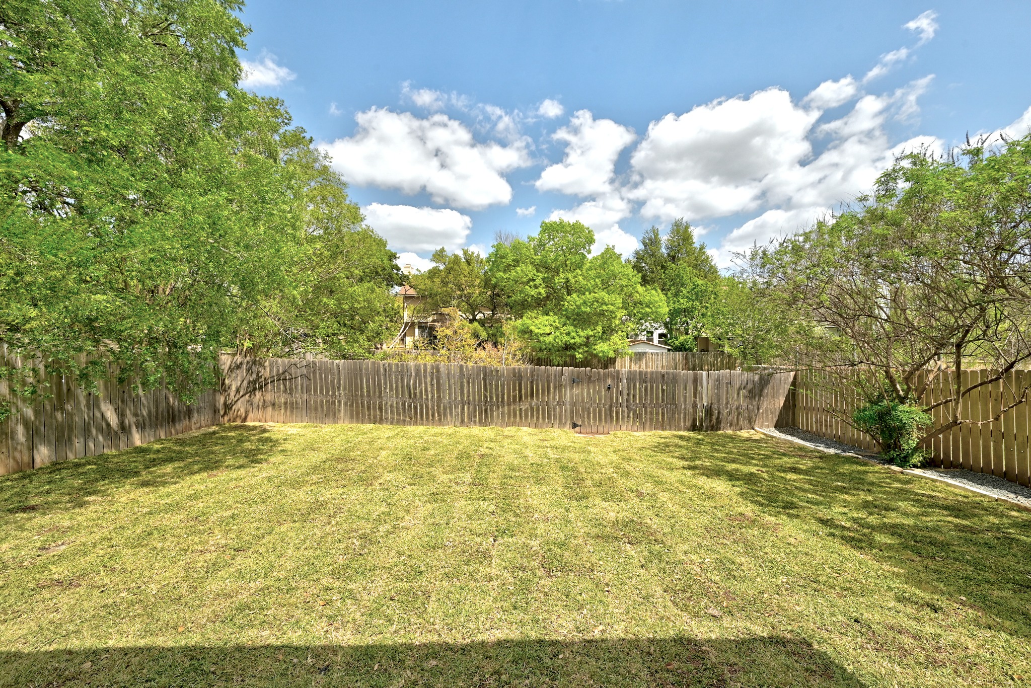 5812 Kayview Drive Austin, TX 78749 - Photo 30 of 31 a swimming pool with trees in the background