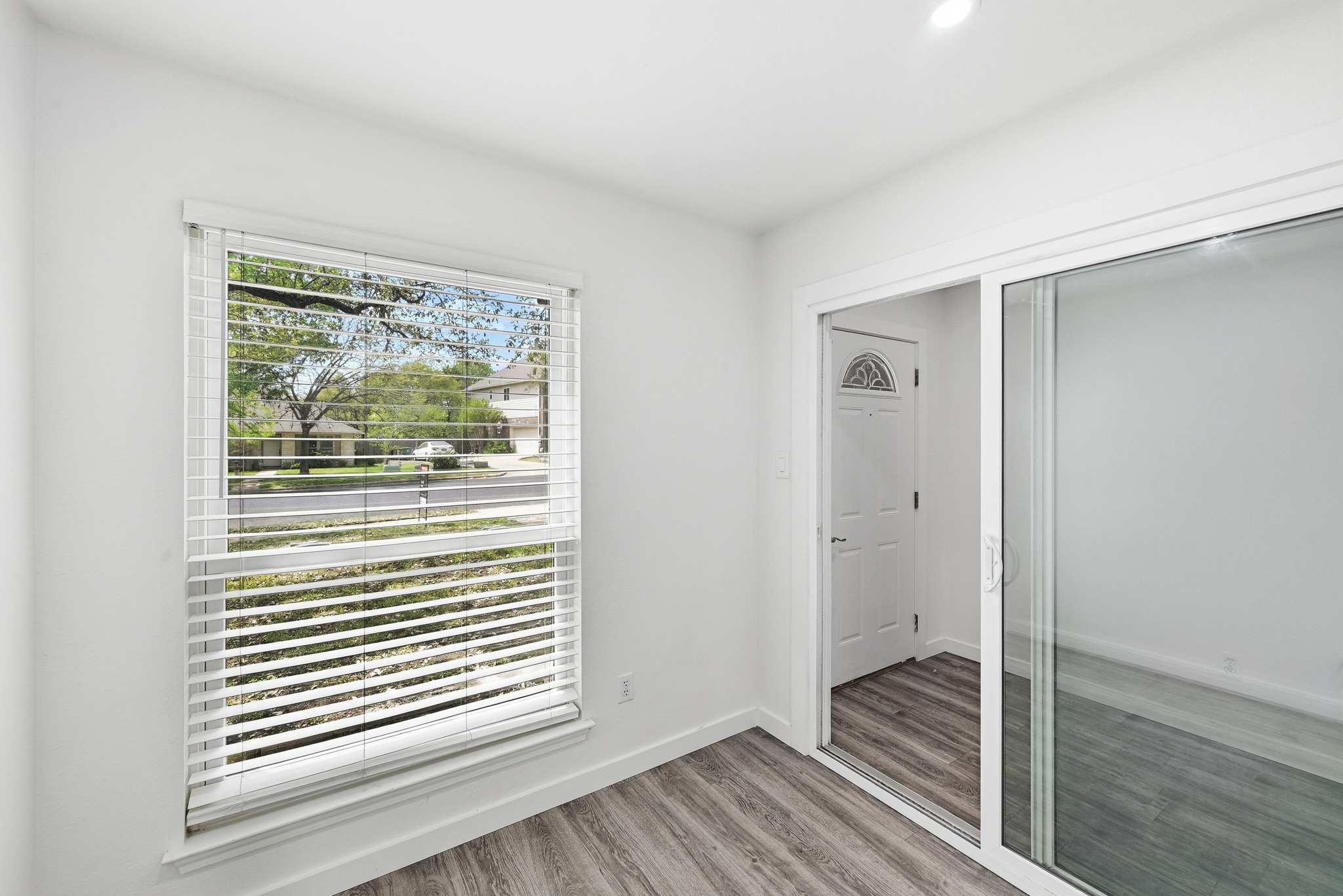 5812 Kayview Drive Austin, TX 78749 - Photo 5 of 31 a view of a livingroom with wooden floor and a window