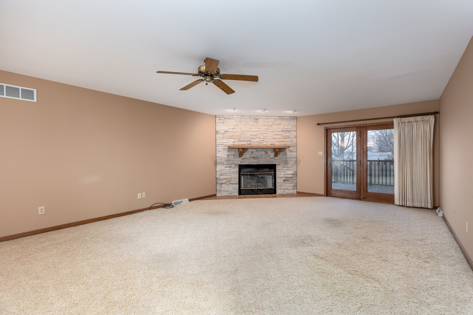 145 Porter Avenue Grand Ridge, IL 61325 - Photo 11 of 32 an empty room with fireplace and windows