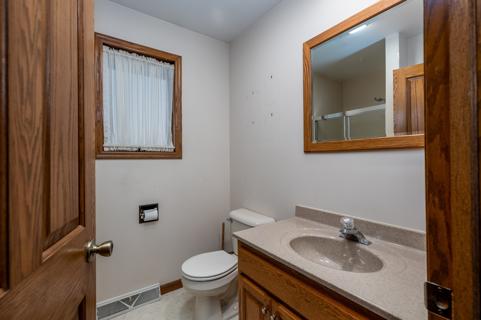 145 Porter Avenue Grand Ridge, IL 61325 - Photo 15 of 32 a bathroom with a sink toilet and mirror