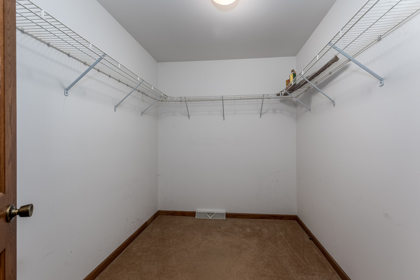 145 Porter Avenue Grand Ridge, IL 61325 - Photo 19 of 32 a view of a room with racks on the wall