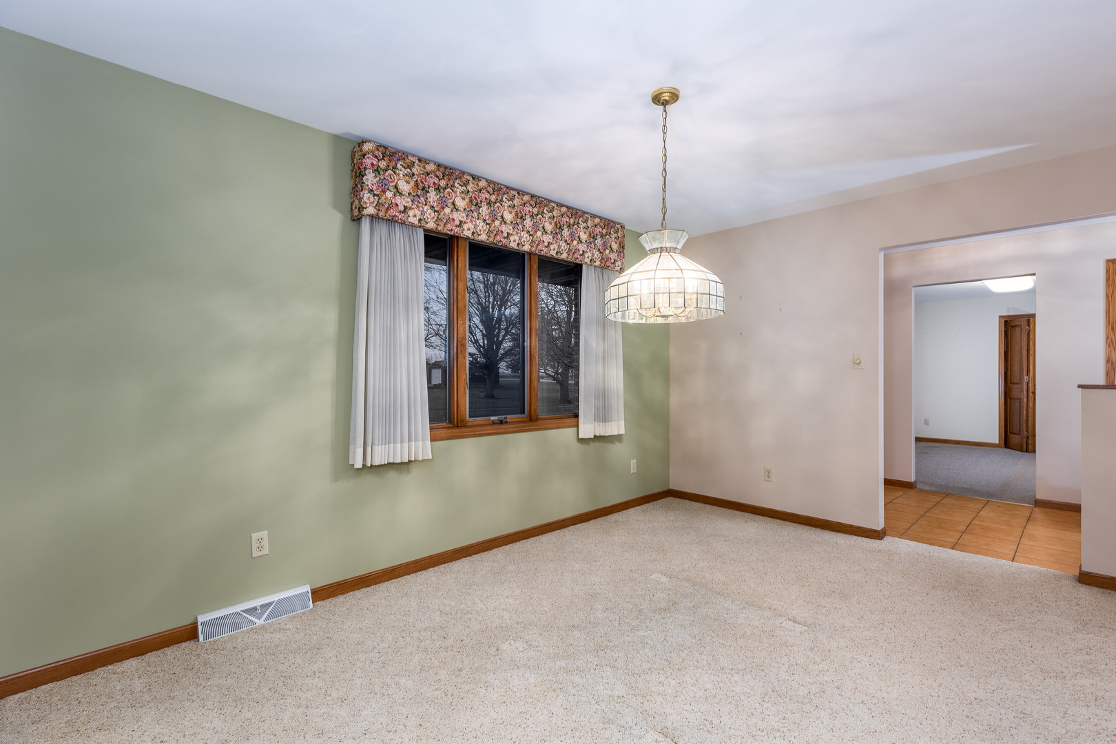 145 Porter Avenue Grand Ridge, IL 61325 - Photo 4 of 32 a view of a room with a chandelier
