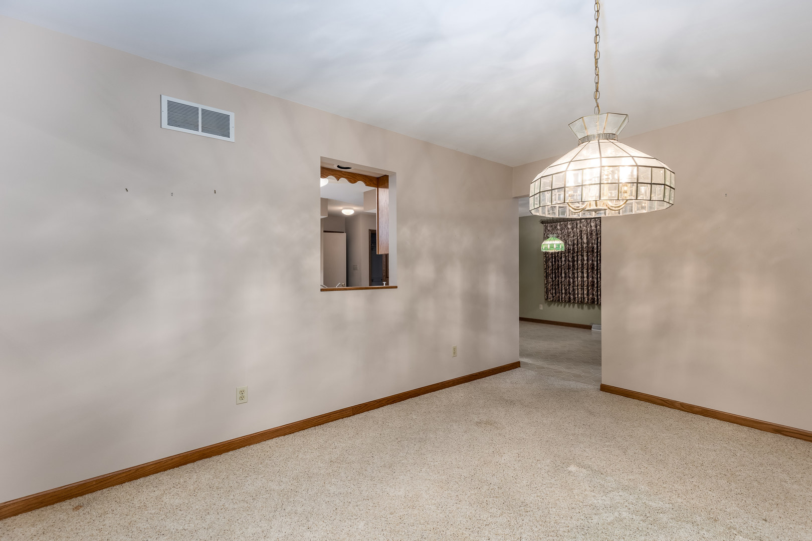 145 Porter Avenue Grand Ridge, IL 61325 - Photo 5 of 32 a view of a room with wooden floor and chandelier