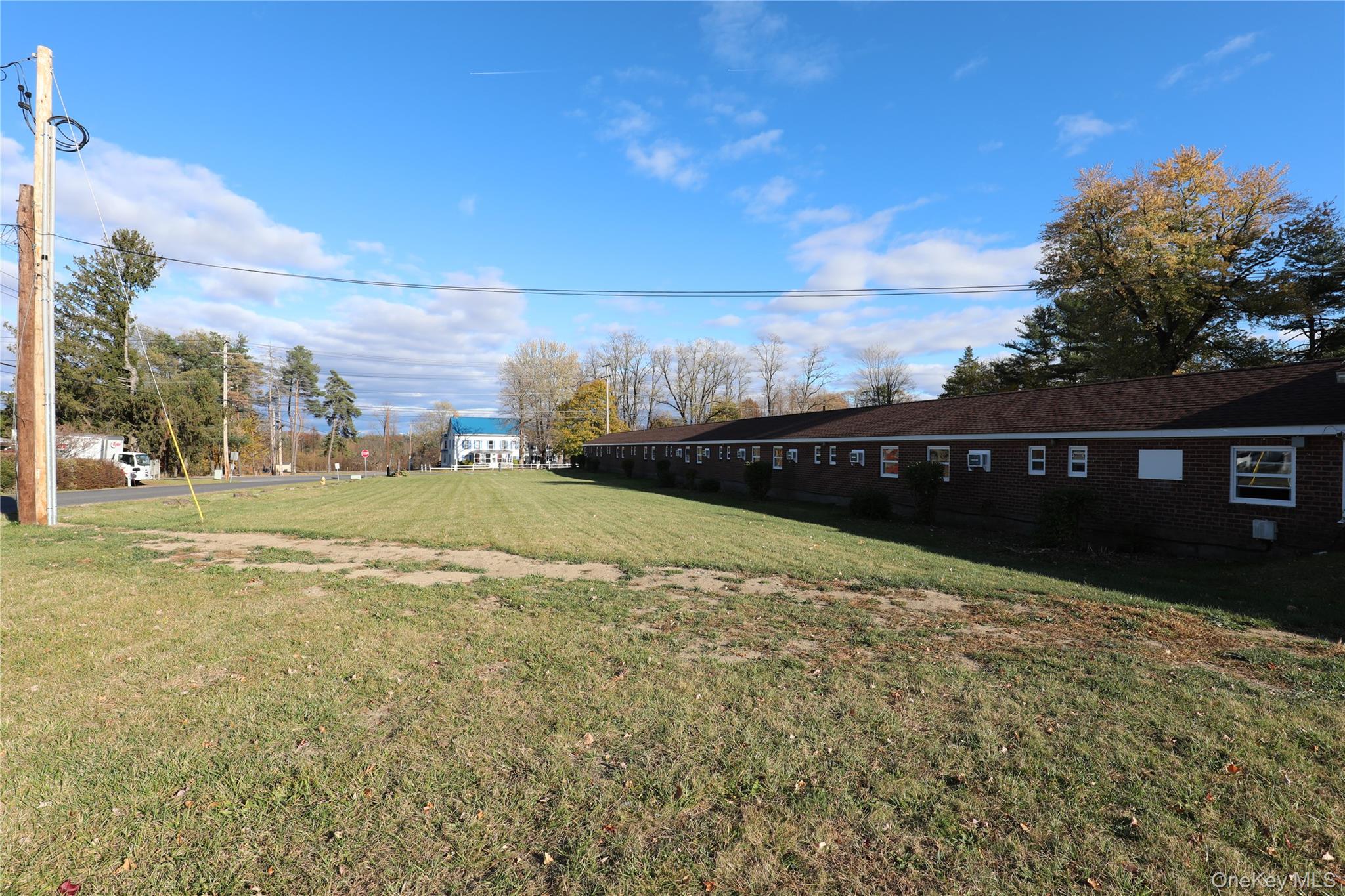 14311 Rte 9W, Unit 2 Ravena, NY 12143 - Photo 9 of 9 a front view of a house with a yard