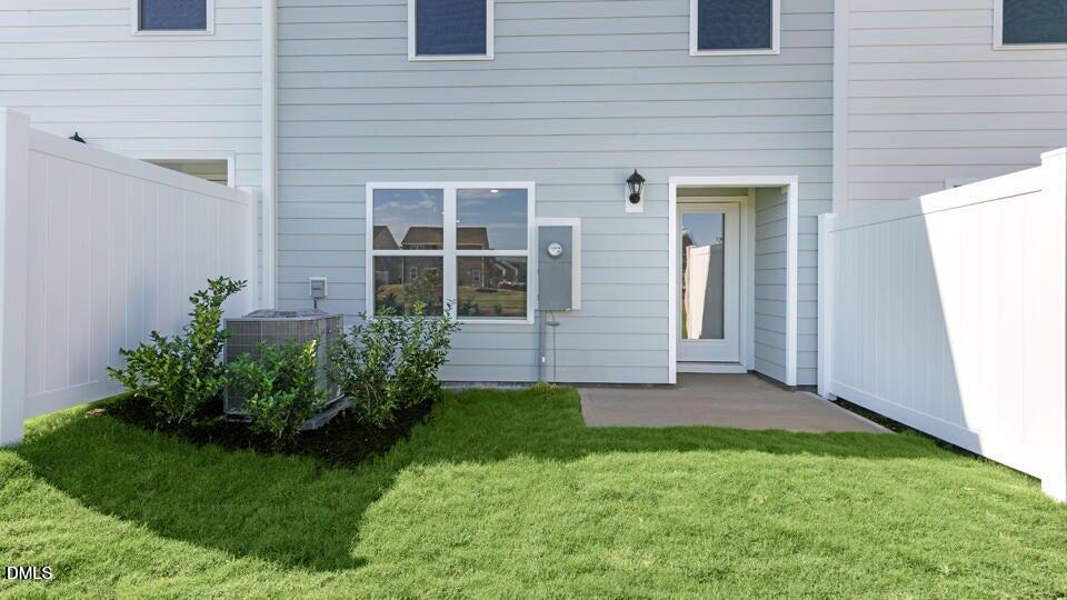 536 Stream Walk Crossing Wendell, NC 27591 - Photo 29 of 32 a view of front door of house and yard