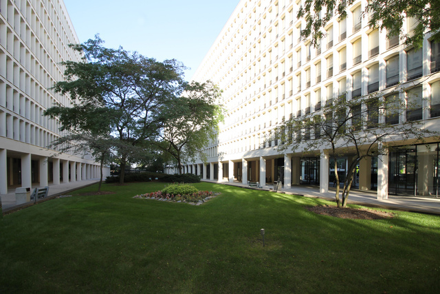 1451 East 55th Street, Unit 523N Chicago, IL 60615 - Photo 1 of 11 a view of a building with a yard
