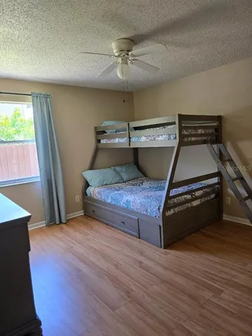 a living room with a couch and a table