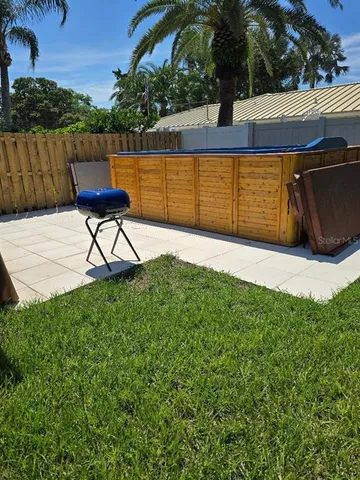a view of a yard with an outdoor space