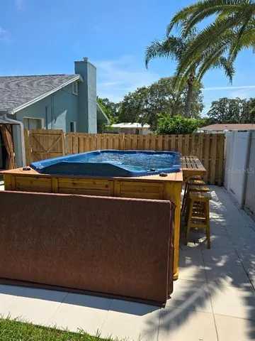 a view of a chairs and table in the terrace