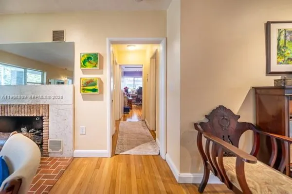 a room with furniture and a flat screen tv