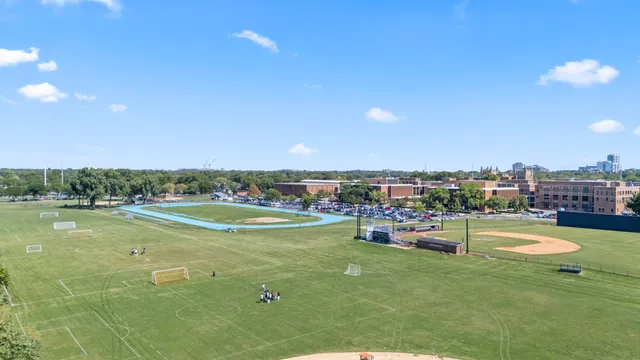 a view of a swimming pool and a yard
