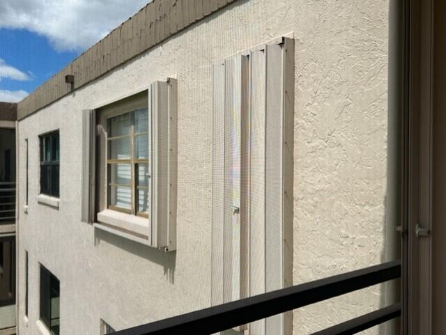 9300 Southwest 8th Street, Unit 408 Boca Raton, FL 33428 - Photo 15 of 18 15-Accordion shutters