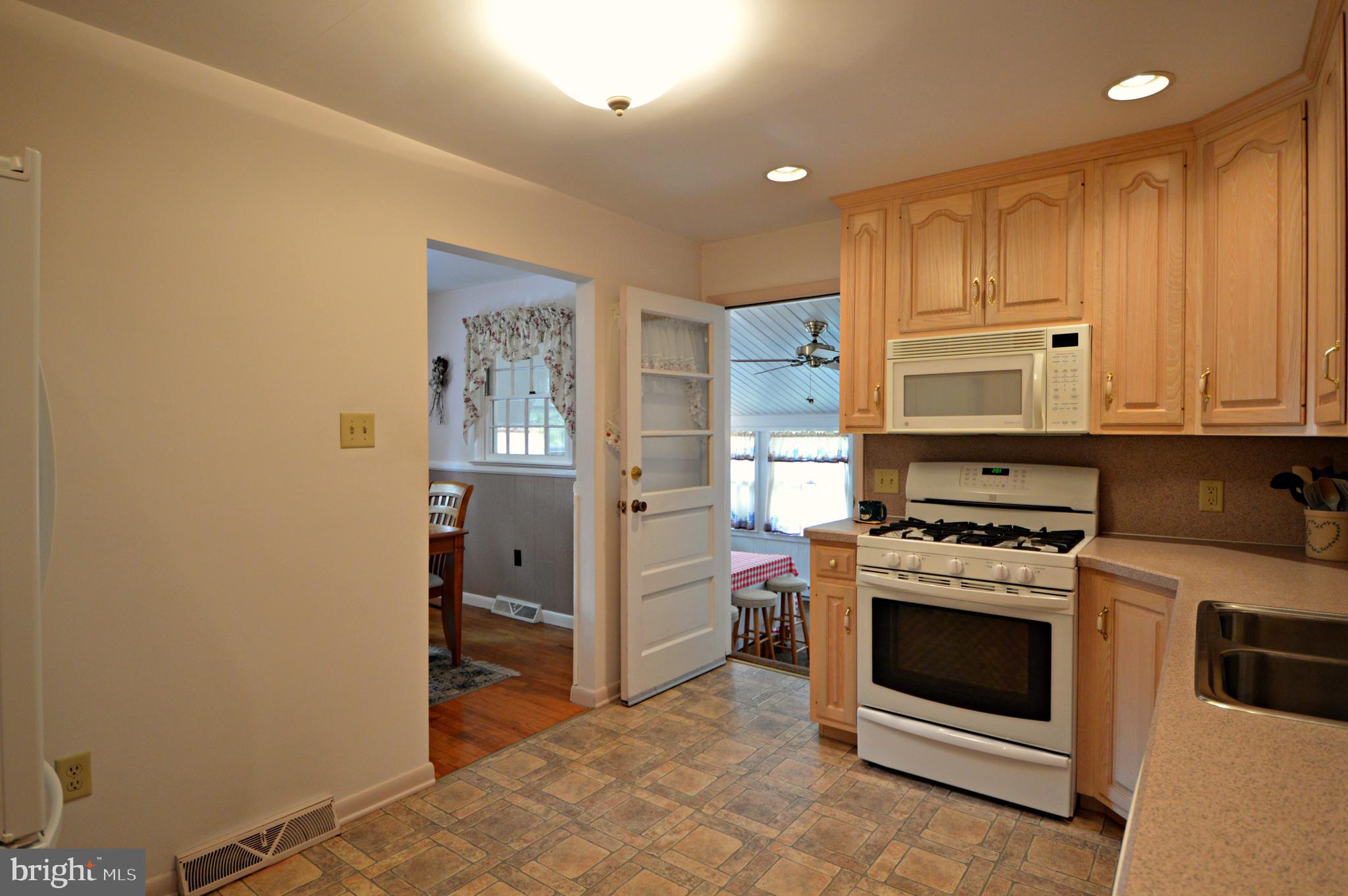511 Spring Avenue Lititz, PA 17543 - Photo 10 of 29 Kitchen view to 4 season room