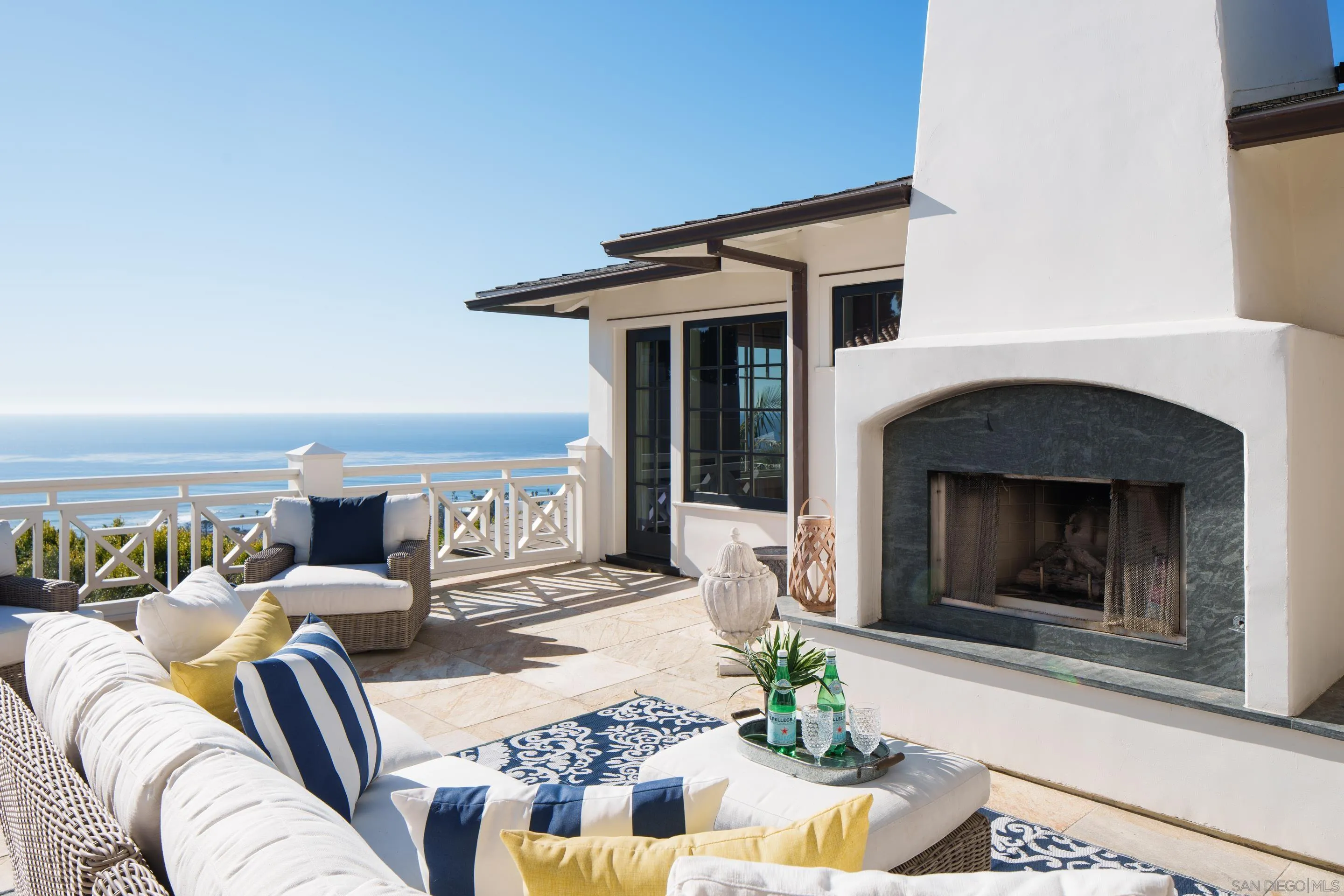 935 Havenhurst Drive La Jolla, CA 92037 - Photo 11 of 21 a living room with furniture and a fireplace