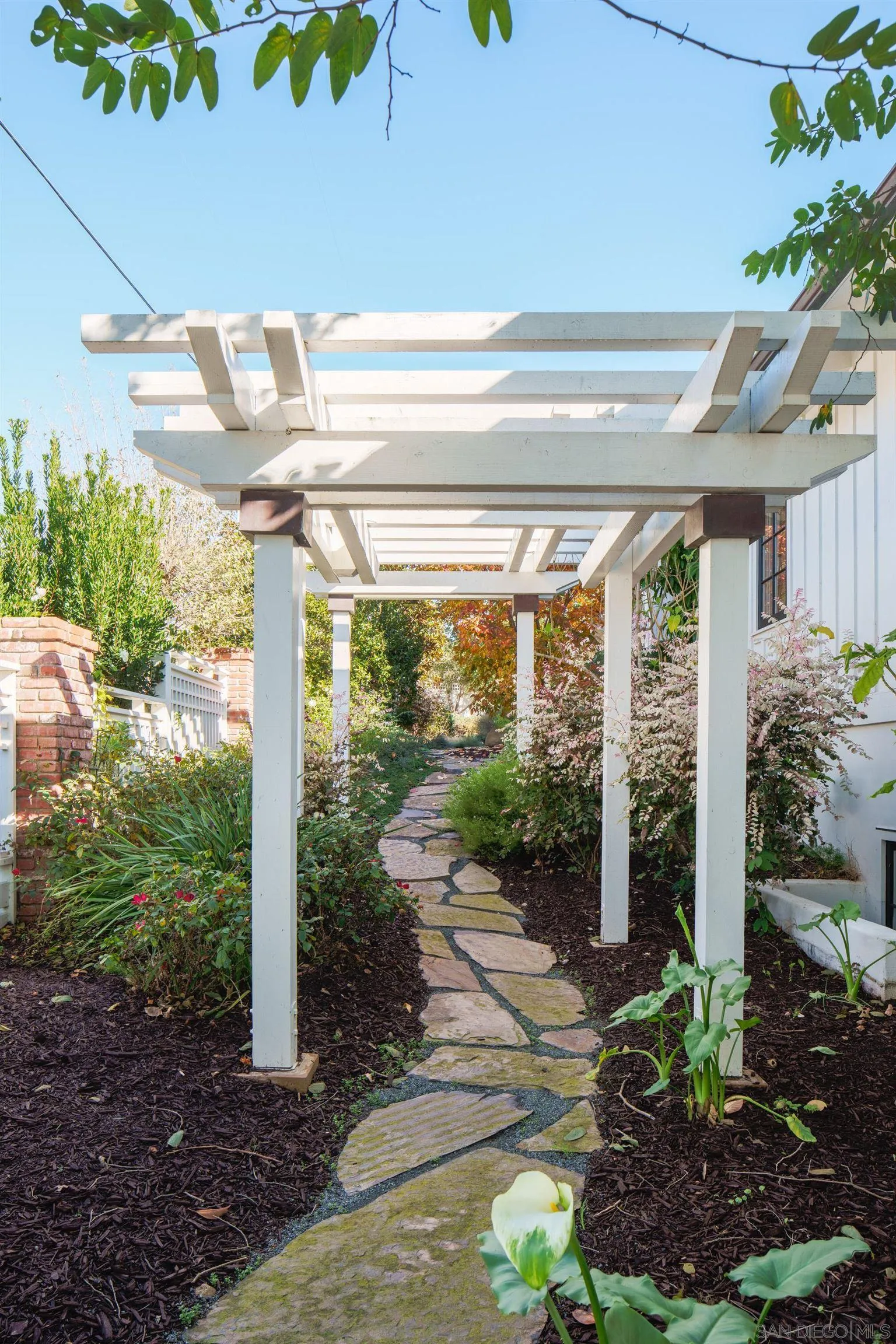 935 Havenhurst Drive La Jolla, CA 92037 - Photo 6 of 21 a porch with seating space and garden view