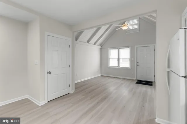 a bathroom with a sink toilet and a mirror