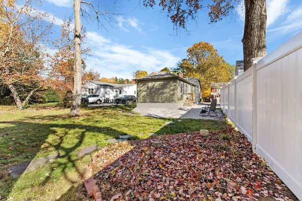 a view of a backyard with a patio