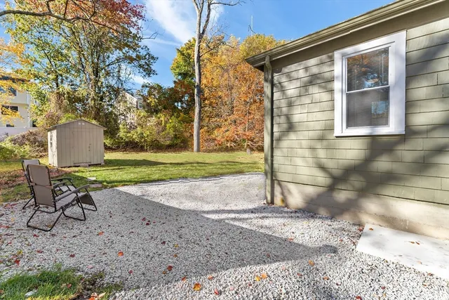 a view of a backyard with a patio