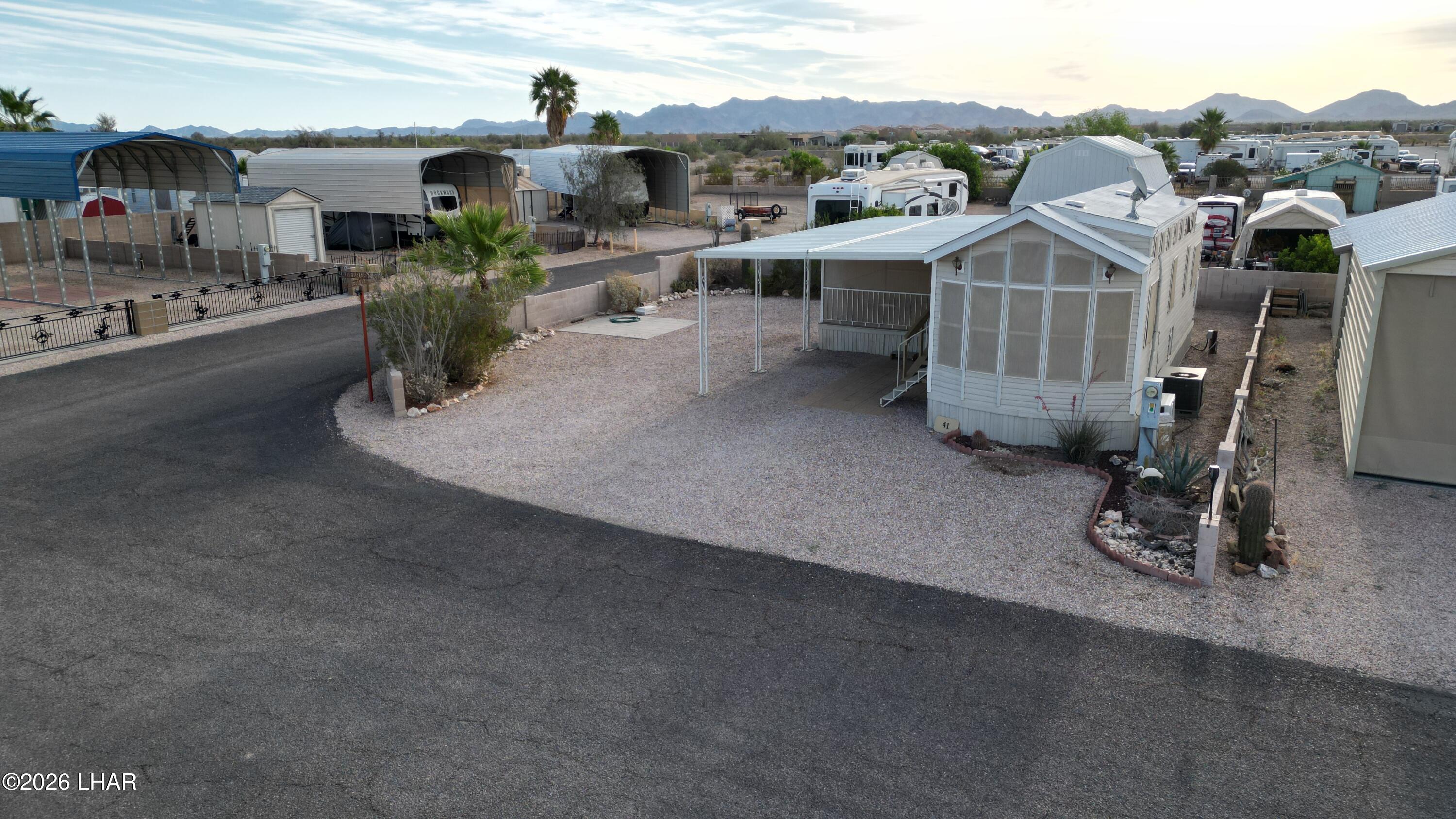 41 North Sagebrush Road Quartzsite, AZ 85346 - Photo 1 of 33 an aerial view of a house with sitting area