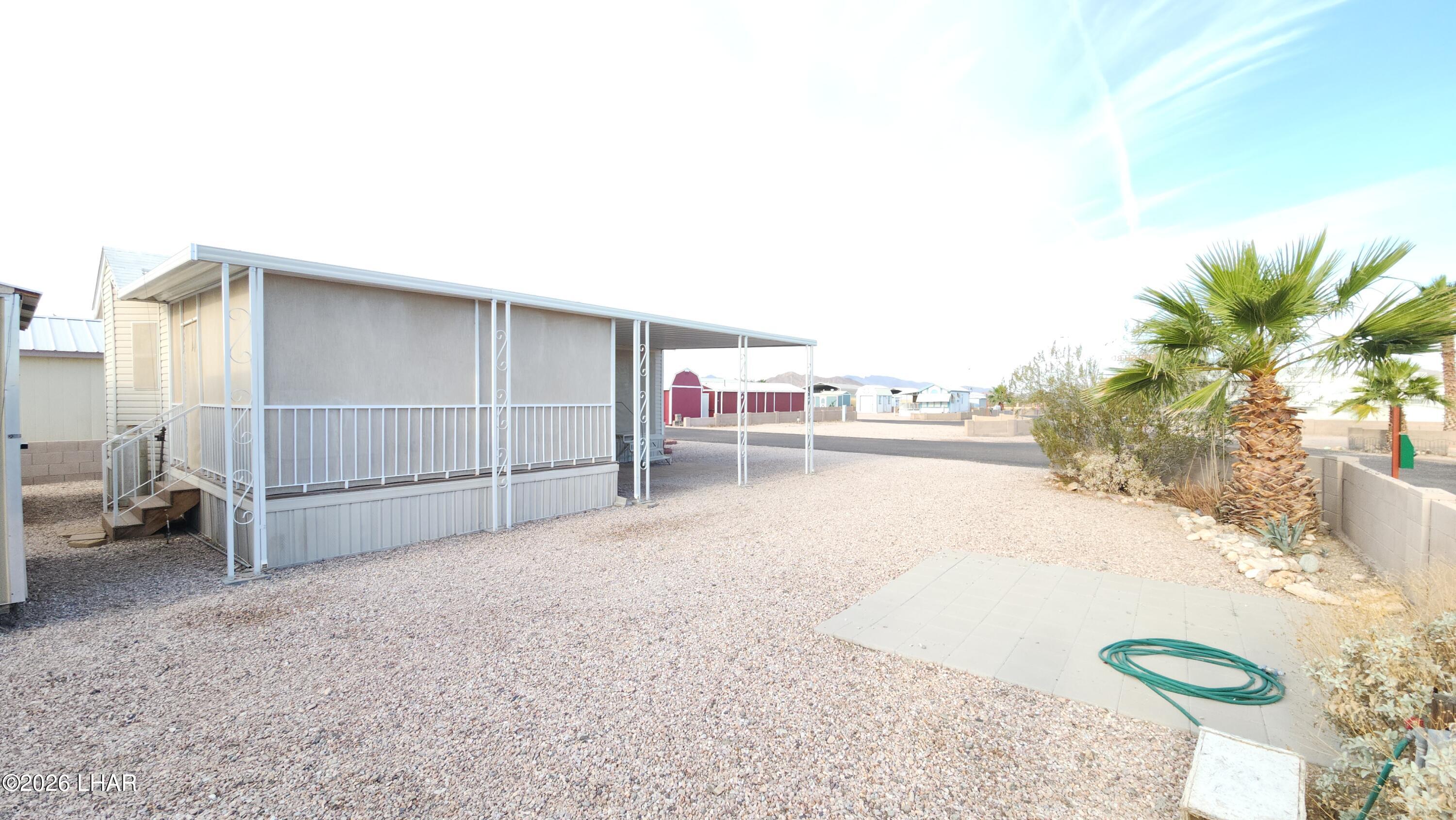 41 North Sagebrush Road Quartzsite, AZ 85346 - Photo 32 of 33 a view of a house with a outdoor space