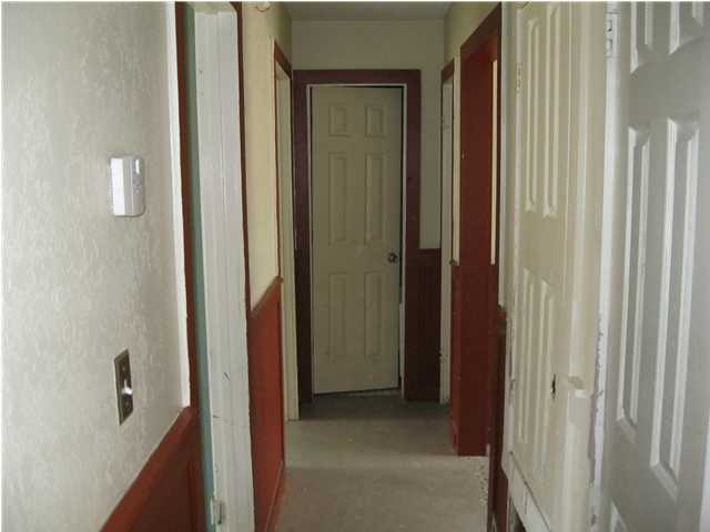 6200 Old Hickory Road Crestview, FL 32539 - Photo 3 of 10 a view of a bathroom from a hallway